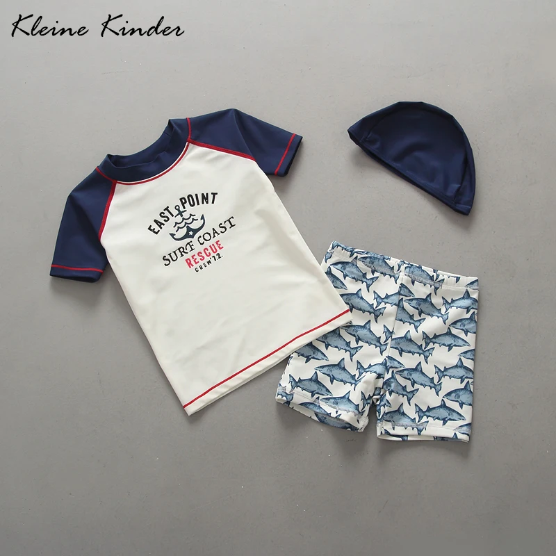 

Super Quality Toddler Swimwear Anchor Print Two Pieces Short Sleeve Rashguard + Swimming Trunks Set with Hat Baby Boy Swimsuit
