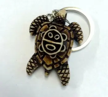 

Alert ! 12pcs Imitation Yak Bone Carving Tribal Sun Smiley Turtle Charm Keychain