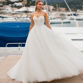 

Ball Gown Tulle Wedding Dresses 2019 Sweetheart Neck Sleeveless Applique Lace Wedding Gowns with Beading Sashes Plus size
