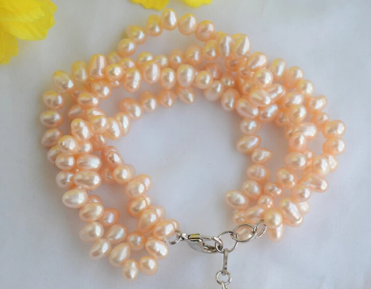 

shippingZ6491 4strands 7mm rice pink freshwater pearl bracelet 8inch 5.25