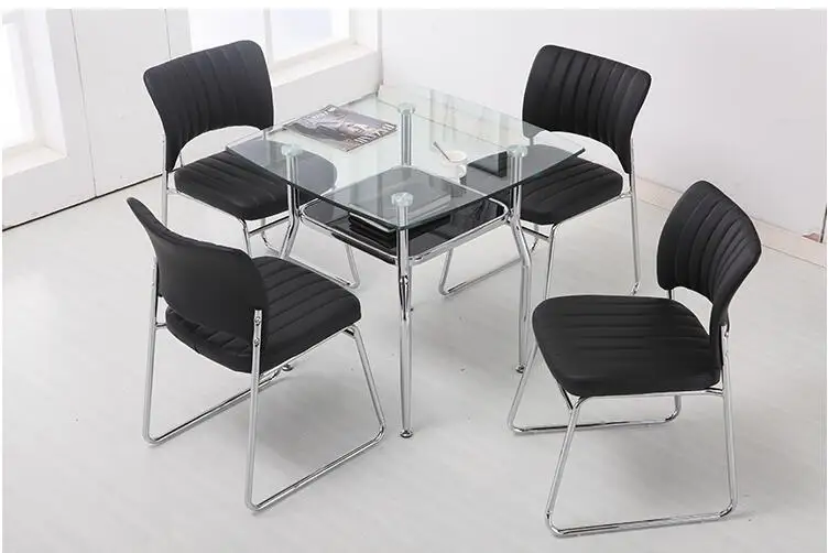 Steel glass small square table... Rest the table.