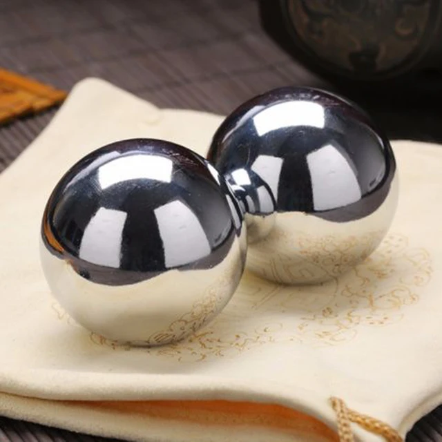 A pair of solid 50MM or 60MM bearing steel ball wear resistant anti