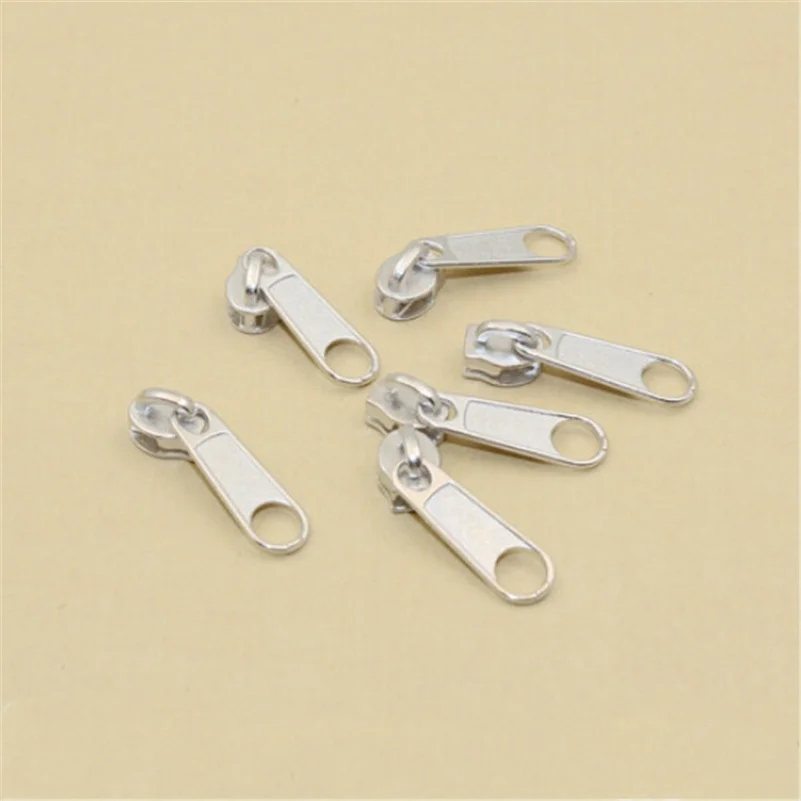 

20Pcs/lot 3# Nylon Zipper Sliders Puller DIY Handwork Bag Siver color AA7665