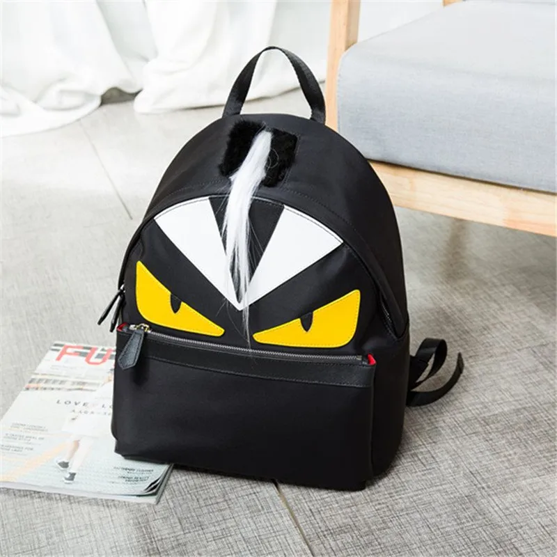 

2019 new unisex brand custom backpack yellow and black monster feather decoration snake pattern high quality bag