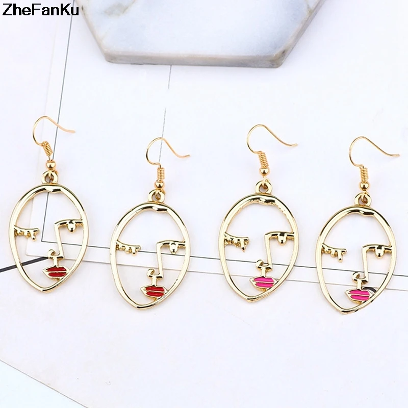 

2019 Trendy Hollow Abstract Face Pendant Women Art Stylish Earrings Dropshipping