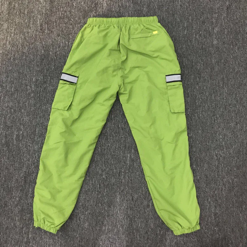 green supreme pants