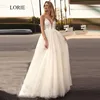 Best Price LORIE Ladies Beach Wedding Dresses A Line White Tulle Sexy Backless Appliqued with Flowers Free Shipping Bridal Gowns 2018 32904776718