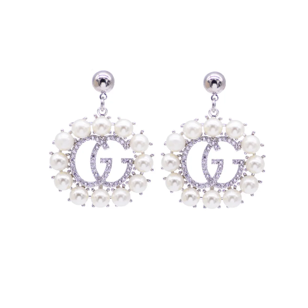 

Panda100 Earrings for women Personality exaggeration with zirconium G letters