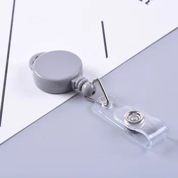 

Plastic easy-to-pull metal easy-to-pull metal certificate button telescopic cartoon easy-to-pull button down button