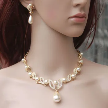 

Gold Tone Cream Pearl Water Drop Pearl and Rhinestone Crystal Bridal Necklace and Earrings Jewelry Sets