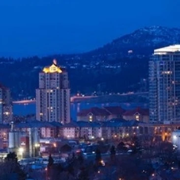 British Columbia  Okanagan Valley  Kelowna Skyline Poster Print by Walter Bibikow (36 x 24)