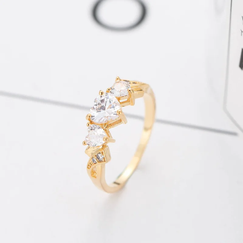 

Explosion Models New European and American Simple Three Hearts Romantic Micro Inlaid Zircon Copper Ring