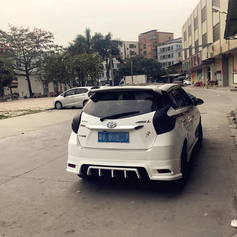 

For Toyota Yaris YarisL Spoiler ABS Material Car Rear Wing Primer Color Rear Spoiler For Toyota Yaris L Spoiler 2014-2017