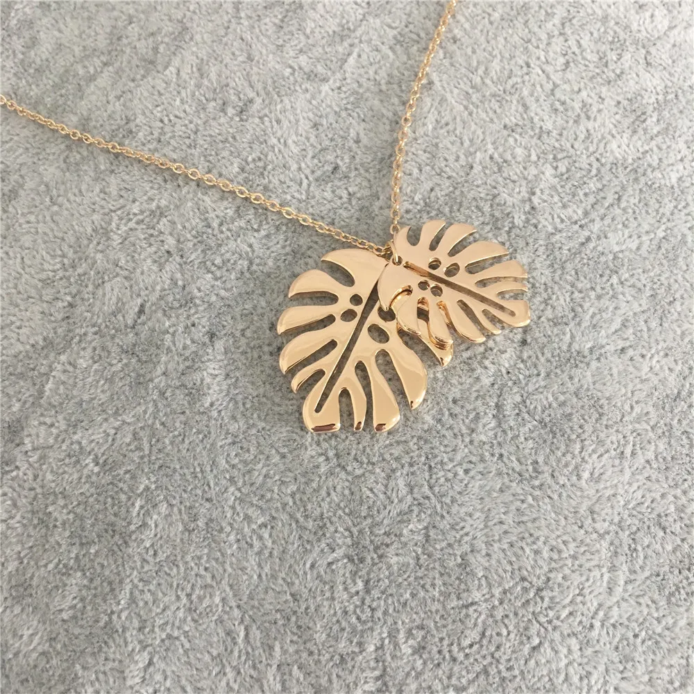 

Trendy gold color two palm tree leaf pendant necklace for woman girl