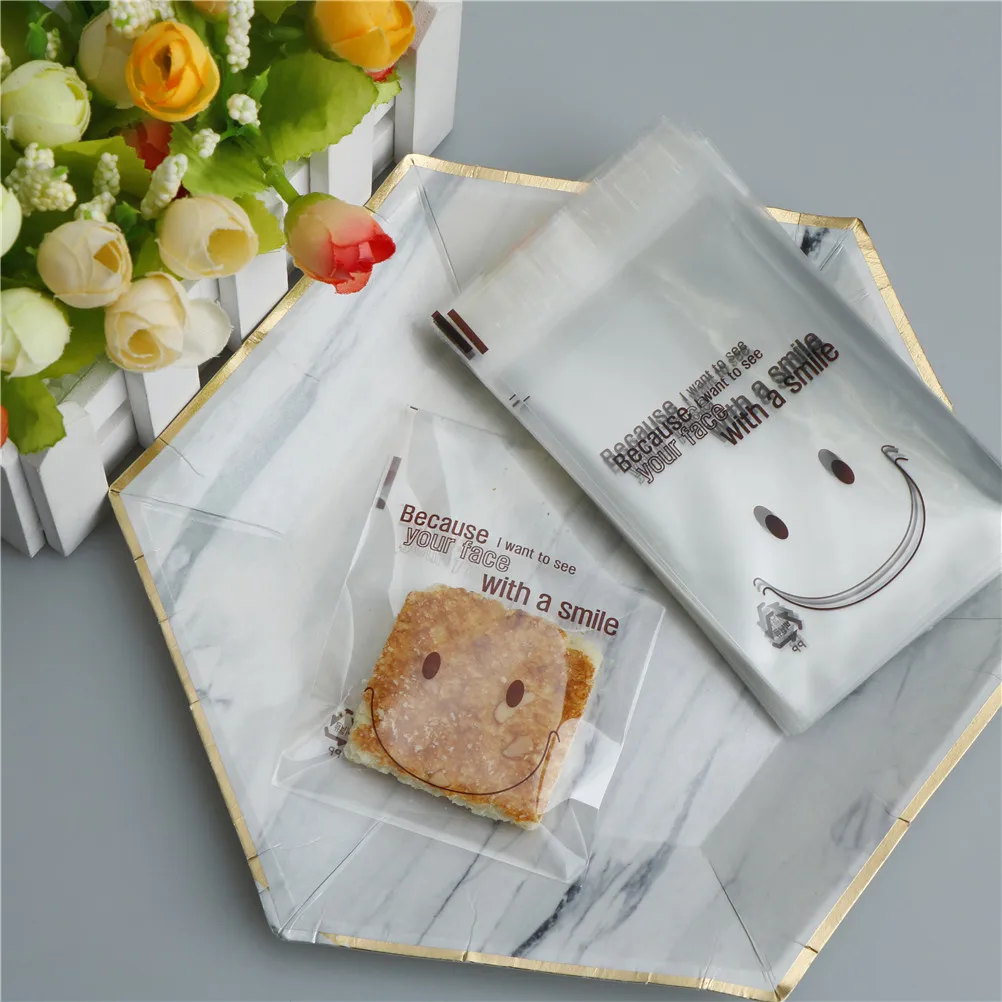 100 Pcs/Pack Cute Smile Packing bag Self Seal Adhesive Cellophane Sweet Cookies Candy Party Gift Bag
