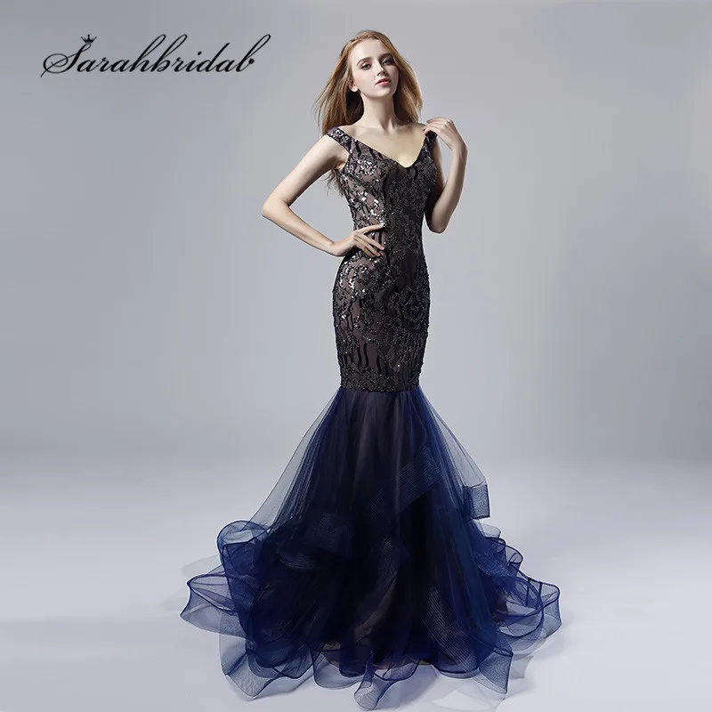 Navy Blue Evening Dresses Long Mermaid Sexy V Neck Cap Sleeves Backless Vestido de Noche Ruffles Skirt Beaded Prom Gowns CC528 Navy Blue Evening Dresses Long Mermaid Sexy V Neck Cap Sleeves Backless Vestido de Noche Ruffles Skirt Beaded Prom Gowns CC528