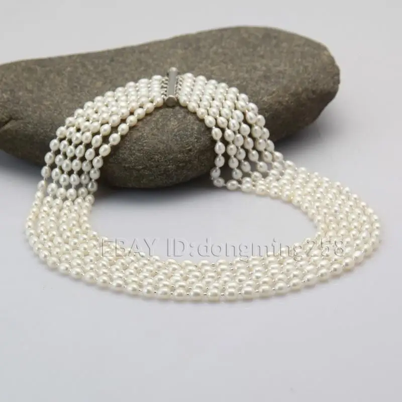 

Wholesale fast women of gift 6 row AA 5x6mm white oval fresh water cultured pearl necklace s654 AAA