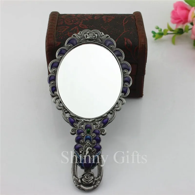 Peacock mirror with hand (18)