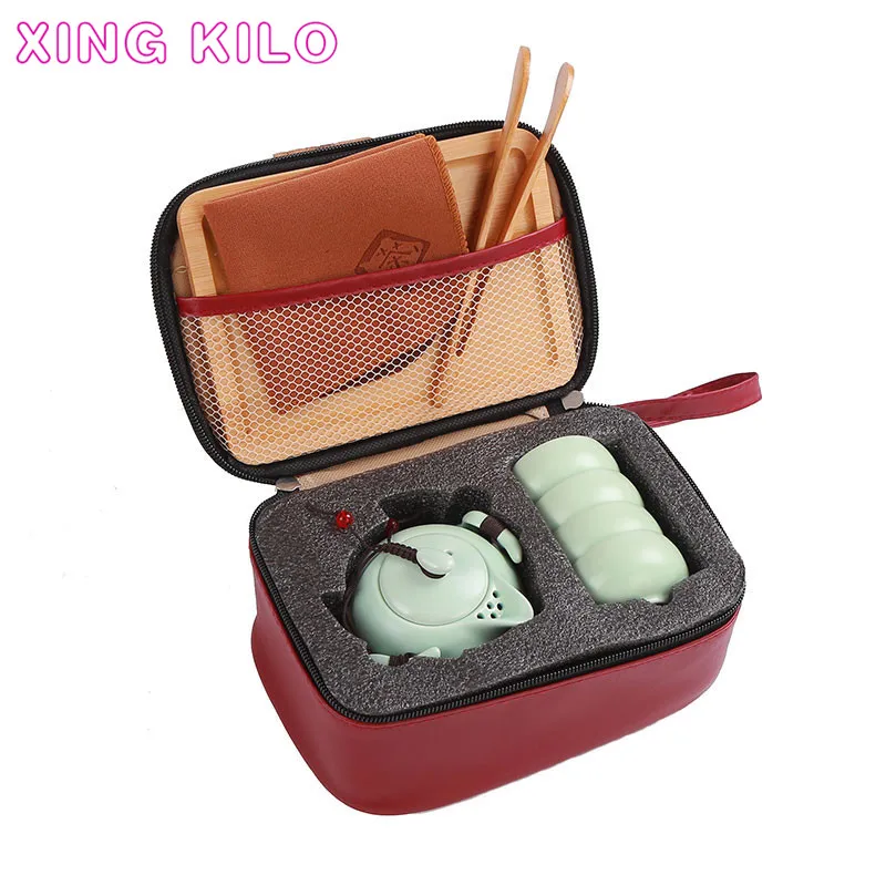 XING KILO Travel tea set portable bag home kung fu ceramic teapot fast customer a pot two or two cups gift custom logo XING KILO Travel tea set portable bag home kung fu ceramic teapot fast customer a pot two or two cups gift custom logo