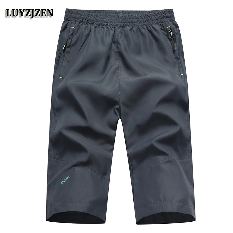 

Summer Shorts Men New Arrival Mens Breathable Bermuda Shorts Knee Length Elasticity Brand Quick Dry Casual Solid Plus Size 638