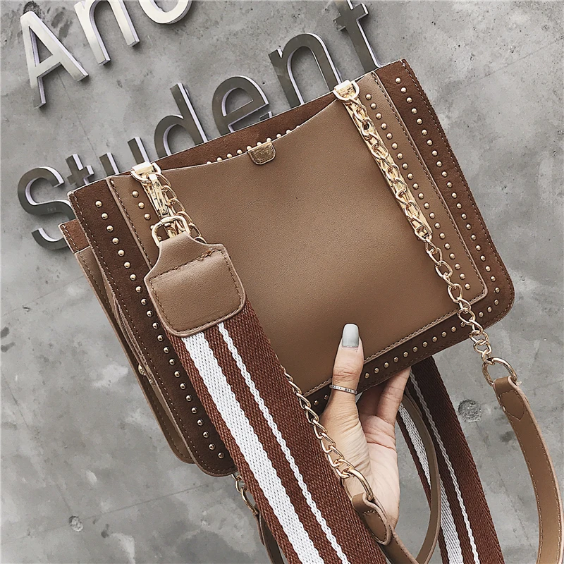 

Bag for women 2019 summer new fashion popular personality rivet tote bag Korean version of the wild shoulder slung female