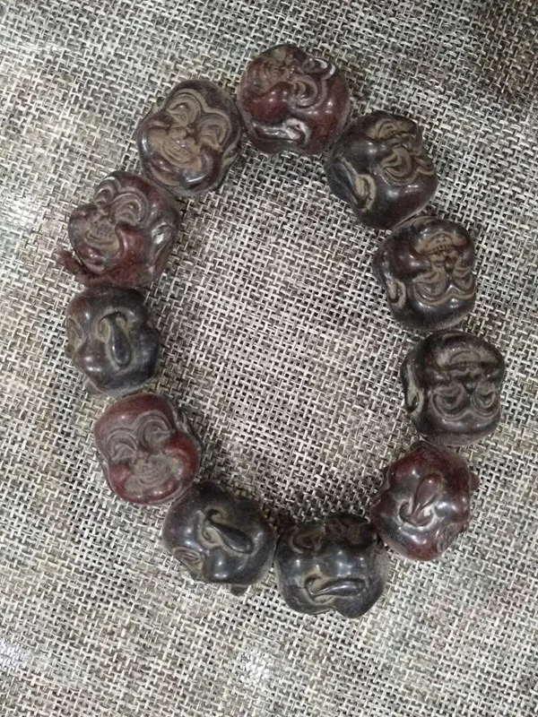 

Antique collection horn bone carving Buddha head String Bracelet hand