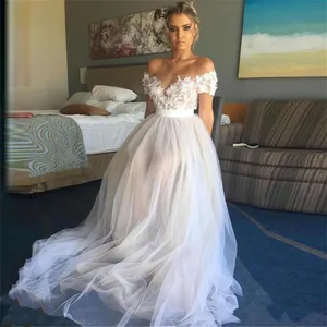 Image 2 - Beach Wedding Dresses A Line Off The Shoulder White Ivory Appliques Lace Tulle Short Sleeves Bridal Gown 2020 Vestido De Noiva