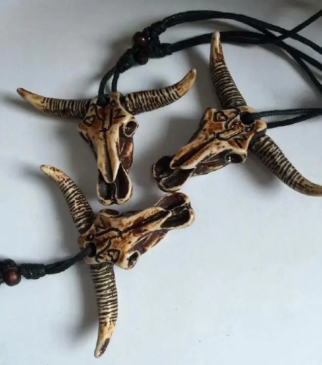

FREE SHIPPING YQTDMY 12 pcs Imitation Yak Bone Carving Tribal Necklace Bull Skull Head Pendant