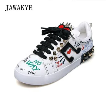 

JAWAKYE Luxury Casual Flat shoes Woman Metal Rivets Studded Flat Lace up runway shoes White Print letters Sneakers for women