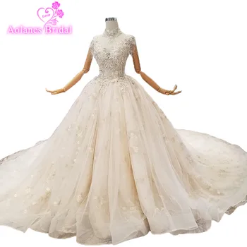 

2018 Champagne Tulle Bead Lace Sleeveless High Neck Cathedral Train Bridal Gowns Backless Ball Gown Illusion Wedding Dresses