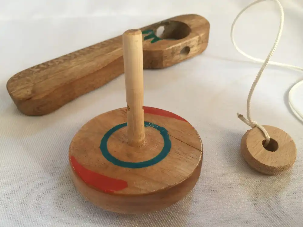 wooden tops with string