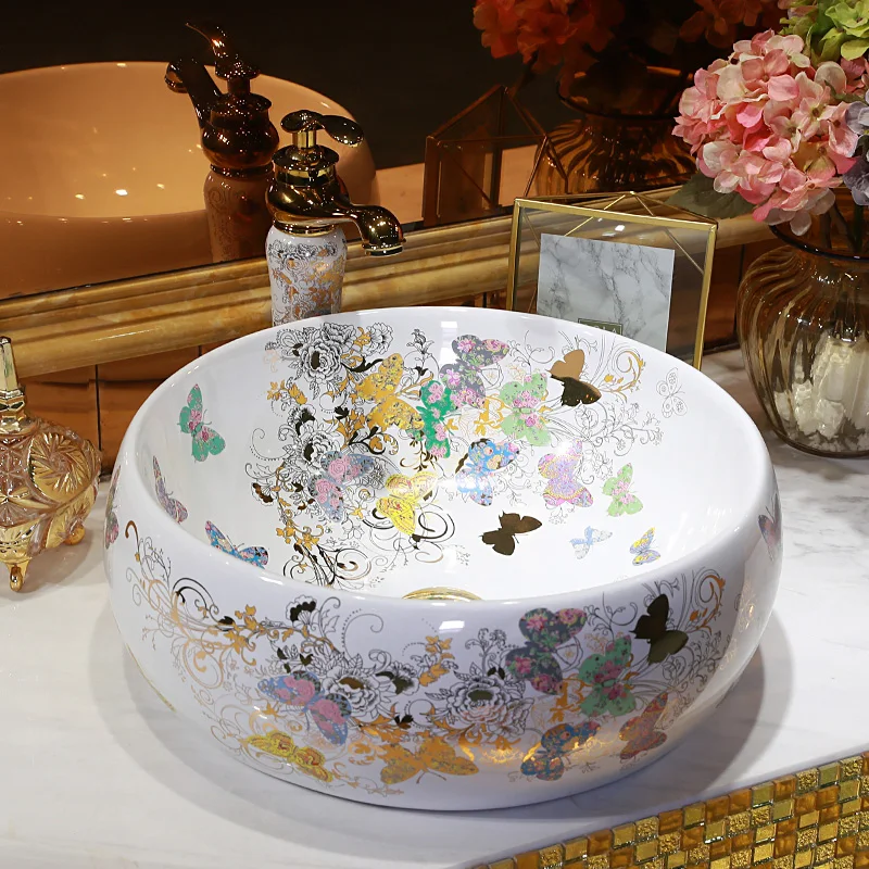 

Bathroom ceramic counter top sink round wash basin popular in europe art basin lavabo chinese Butterfly bathroom sinks