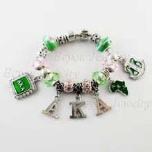 Сестринство серебряный браслет с зеленым бисером