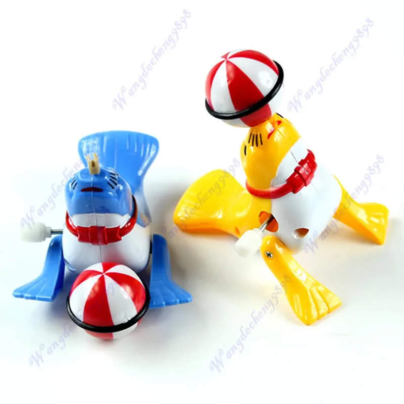

2018 NEW M89C5pcs/lot New Kids Children Toy Gift Cute Lovely Dolphin Clockwork Toy