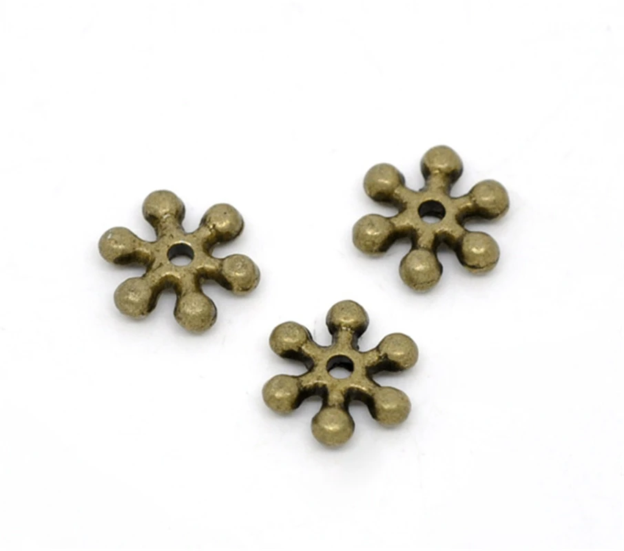 

DoreenBeads 300 Bronze Tone Snowflake Spacer Beads Findings 8x2mm (B12770), yiwu