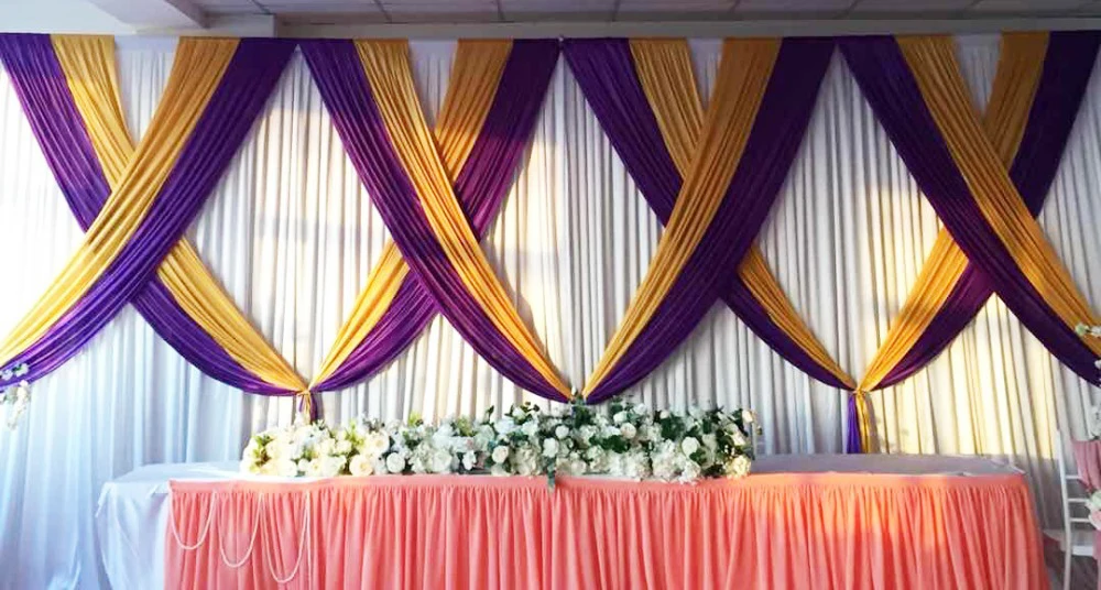 White Wedding Backdrop with gold and purple swags and Drapes Curtain