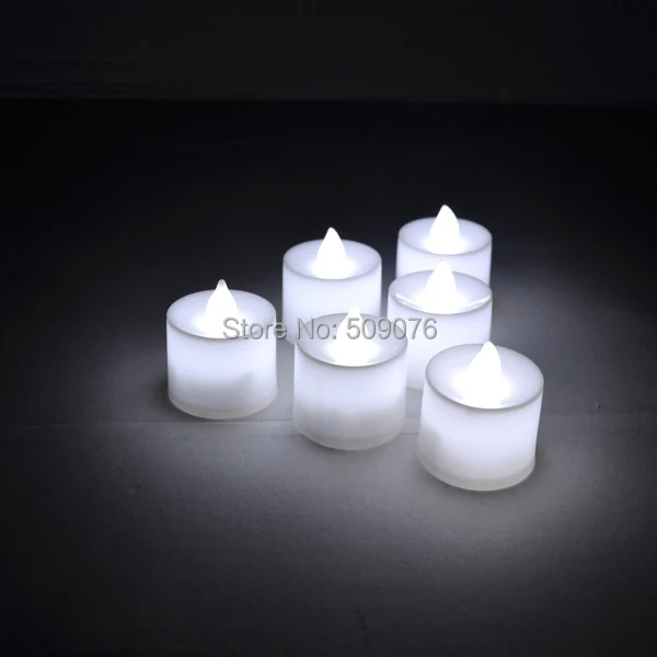 

Free shipping 72pcs/lot Flameless Flicker Battery Operated LED Tea Lights Candles warm White Wedding Xmas Party