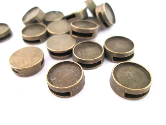

Ten 10mm Brass Plated Bezel Slide Charm Pendants, B208theof
