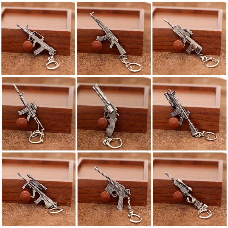

10 Styles Mini Pistol Model Key Chain Fashion M4A1 AK47 Game Series Weapons Gun Keychain for Women Men Souvenirs Jewelry Gifts