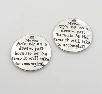 

20pcs 25mm ancient silver lettering Never give up on a dream just because of the time is will take to accomplish charms pendant