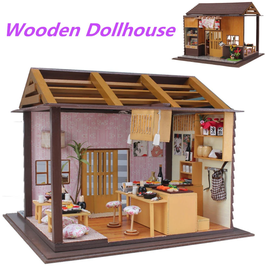 wooden dollhouse with accessories