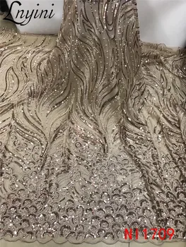 

Wholesale Sequins Lace Fabrics High Quality African Tulle Mesh Lace Fabrics with Beads/Sequins Nigerian Net Lace Fabrics NI1709
