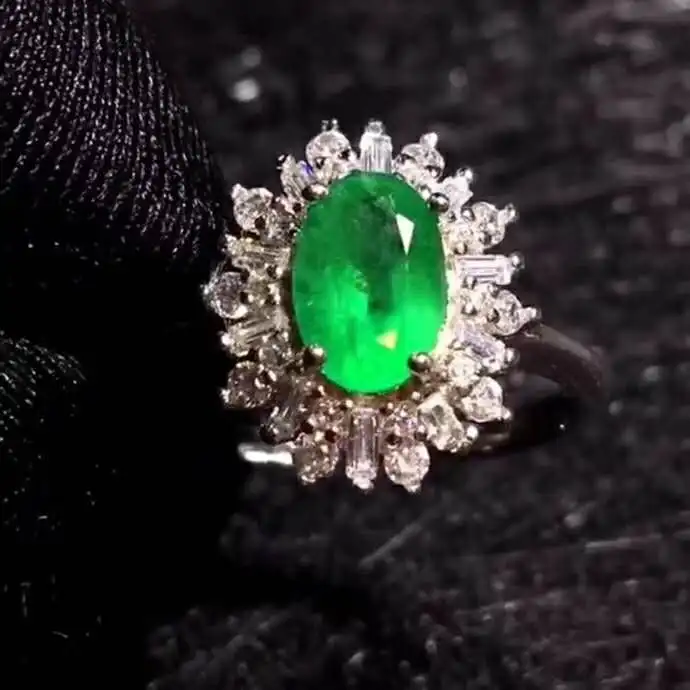 

Pure natural Columbia emerald ring.Ring size: 5*7mm,925 silver Seiko mosaic