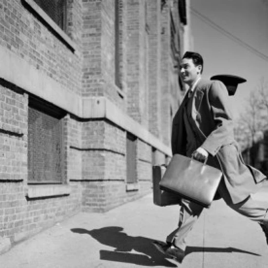 Man running  hat blowing off Poster Print (18 x 24)