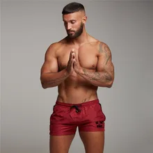 Европейские и американские пляжные короткие летние мужские беговые быстросохнущие спортивные фитнес три короткие дышащие тренировочные шорты