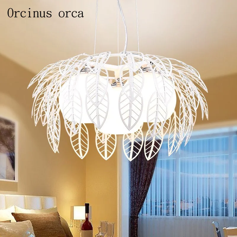 

Nordic modern simple leaf chandelier living room bar creative personality hollowed out leaves three chandeliers free shipping