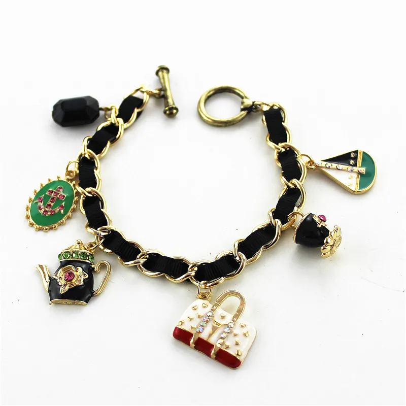 

XQ Free shipping Fashion jewelry fashion party gold purse the teapot new braceletFashion jewelry products golden party Bangles