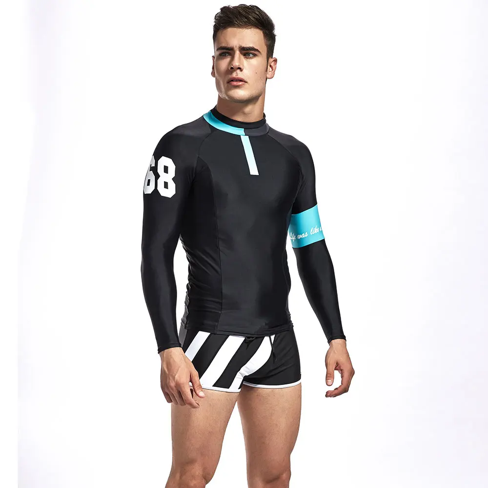 الرجال الجسم الدعاوى الرياضة القماش رياضة السباحة تي شيرت ضيق أعلى ملابس السباحة الغوص رقيقة بذلة تشغيل الملابس قمم إركب الرياح تصفح الرجال الجسم الدعاوى الرياضة القماش رياضة السباحة تي شيرت ضيق أعلى ملابس السباحة الغوص رقيقة بذلة تشغيل الملابس قمم إركب الرياح تصفح