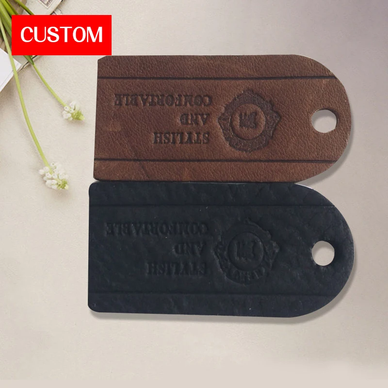 factory private customzied PU leather embossed labels sewing on ladies