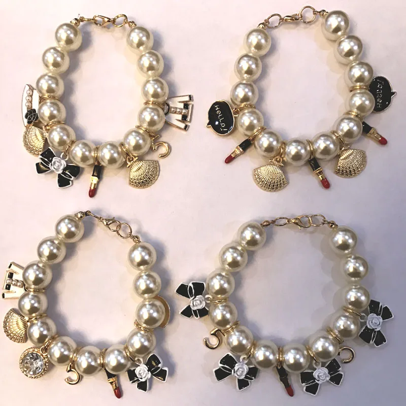 

Fashion jewelry bow/shell charm elastic pearl bracelet&bangles for women/pulseras/pulseira/brazaletebracciali donna/bransoletka